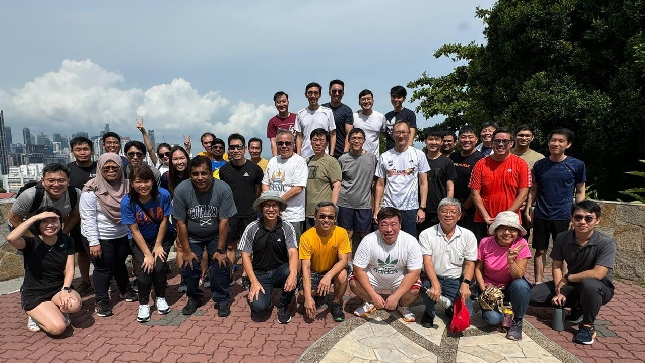 Photo of EMA Chief Executive Puah Kok Keong and employees