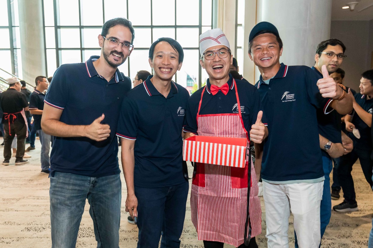Photo of EMA Chief Executive Puah Kok Keong and employees