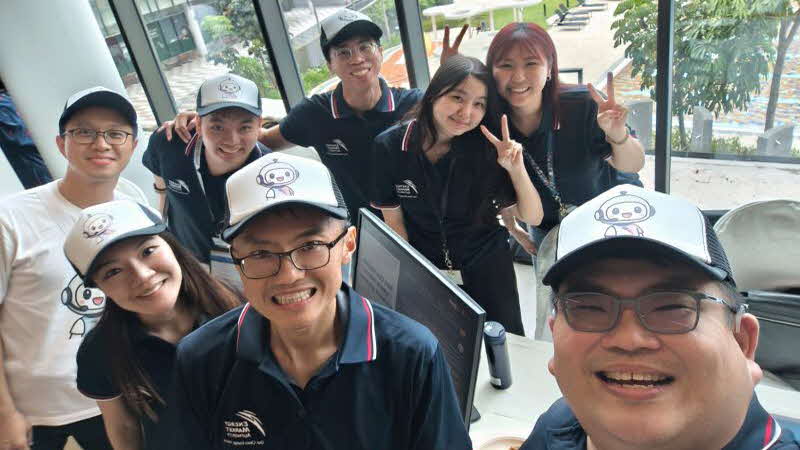 Together with her DAD team, demonstrating MILO's features to EMA staff at the staff forum.