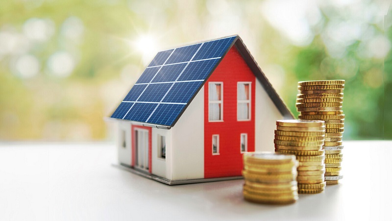 Stock photo of a house and coins
