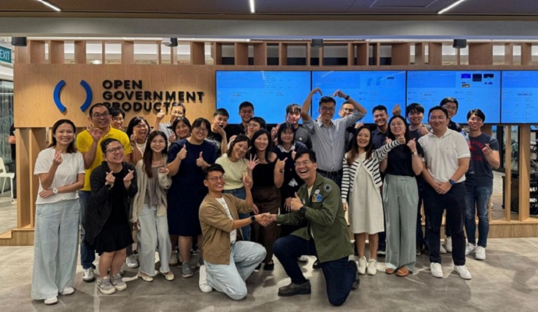 Photo of Eugene Toh with EMA officers who took part in the InnoLab hackathon. 