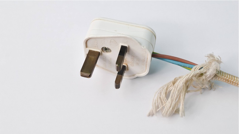 Frayed or cracked wires are considered a fire hazard and should be replaced. 